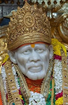 Shri Sai Baba marble murti with golden crown inside the Samadhi Mandir, Shirdi