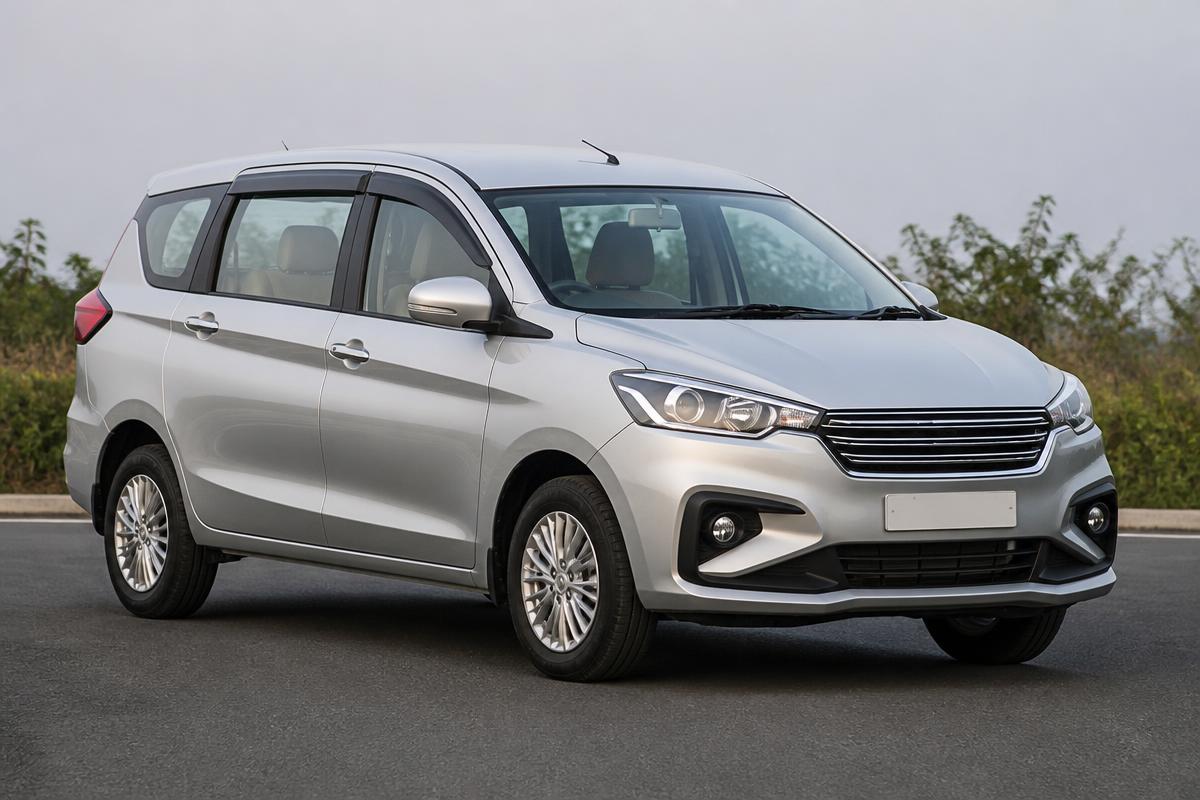 Silver Ertiga 7 seater car for family sightseeing in Shirdi