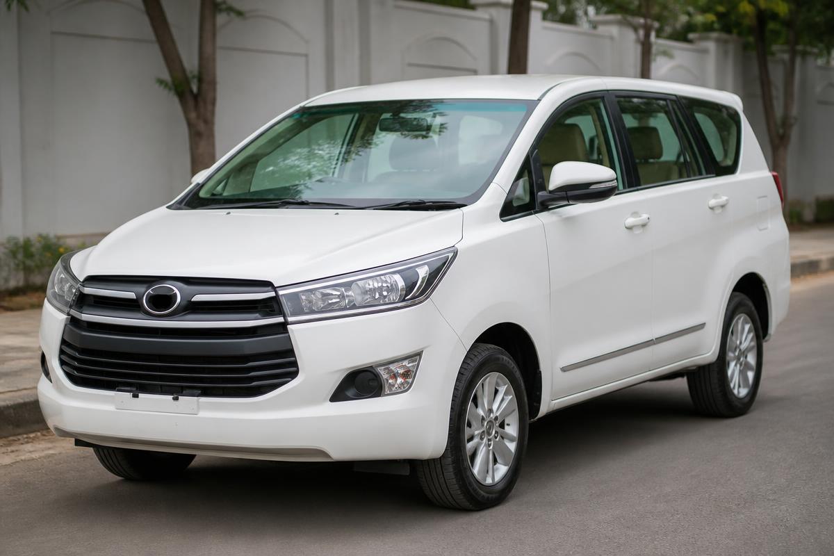 White Innova outstation taxi ready for a long journey from Shirdi